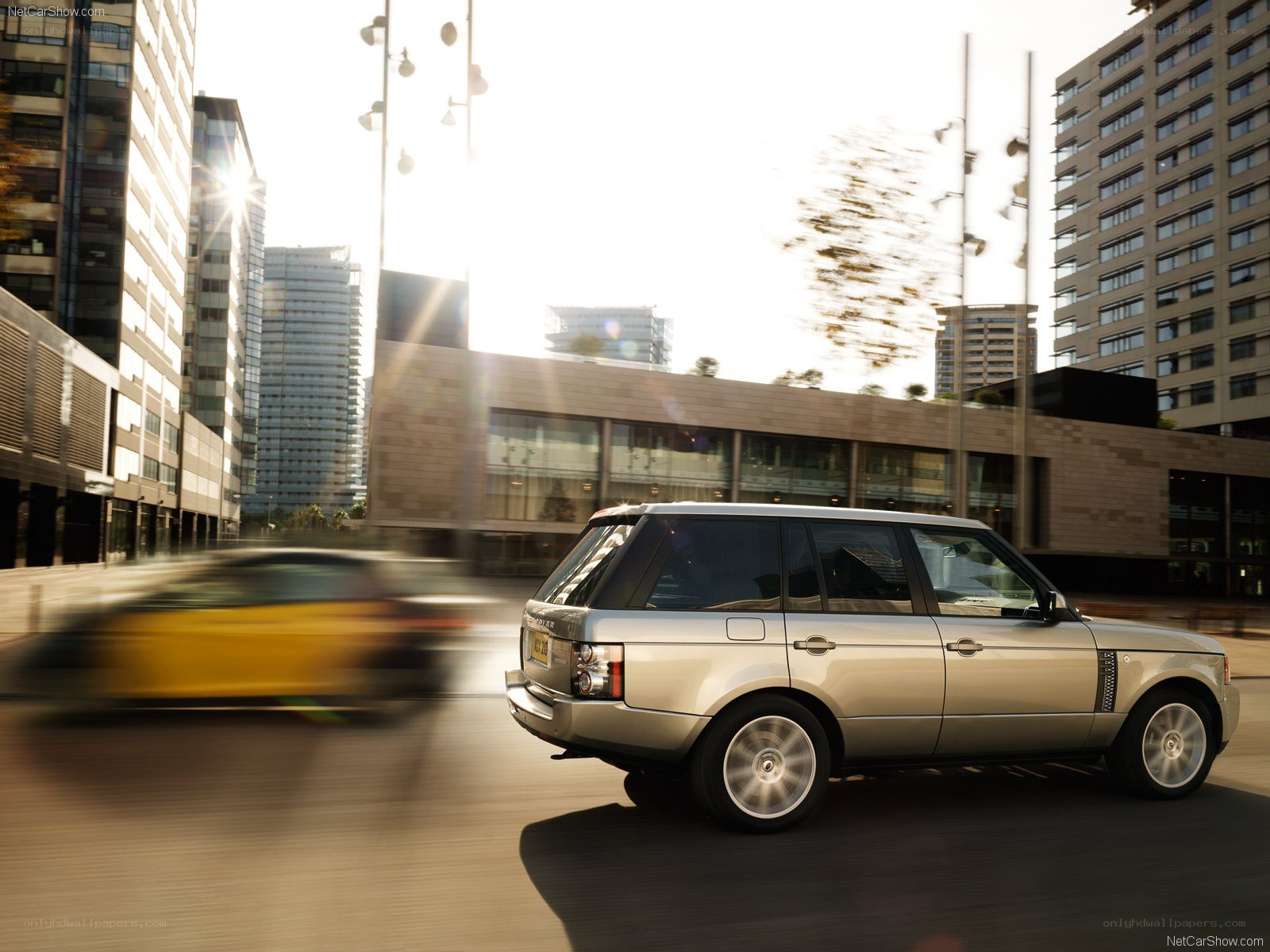 Silver Range Rover in city