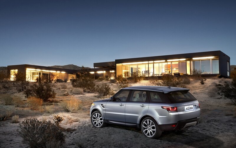 Silver Range Rover in desert