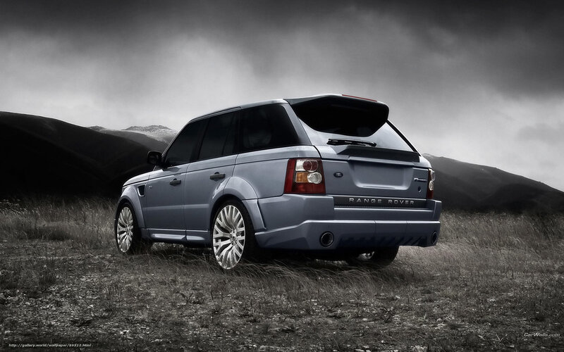 silver range rover in field