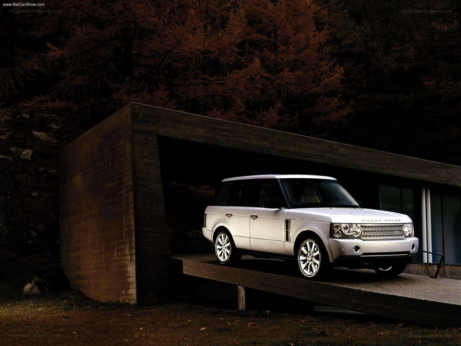 Silver Range Rover in modern garage