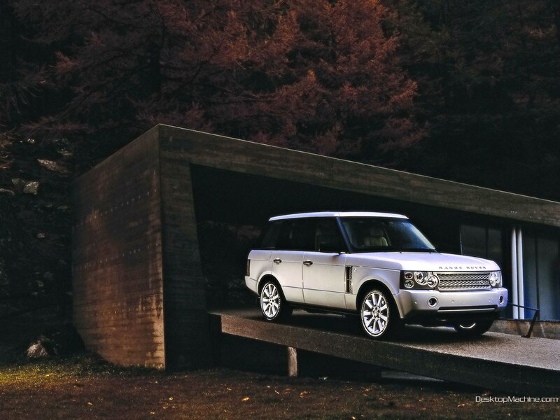 Silver Range Rover in modern garage