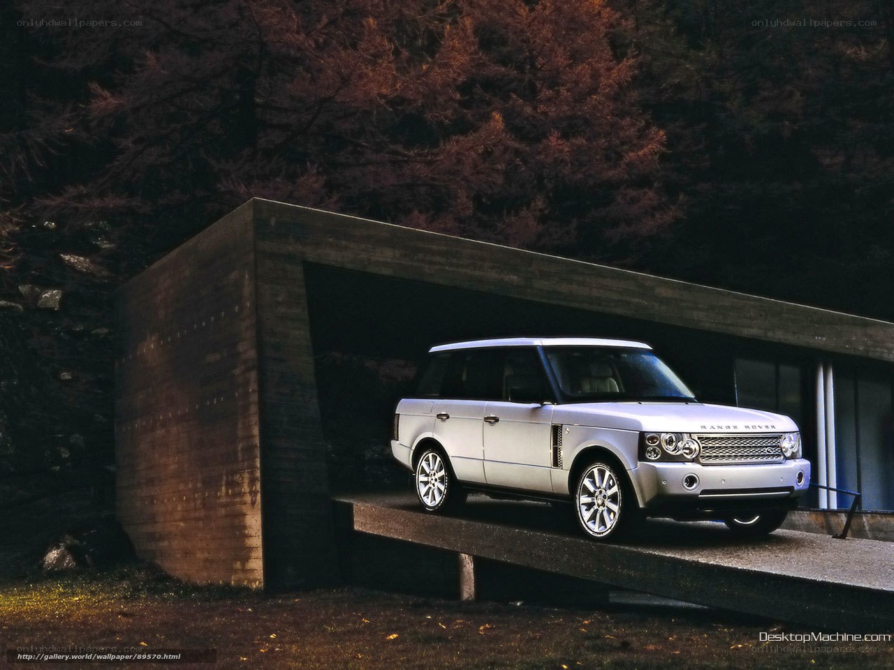 Silver Range Rover in modern garage