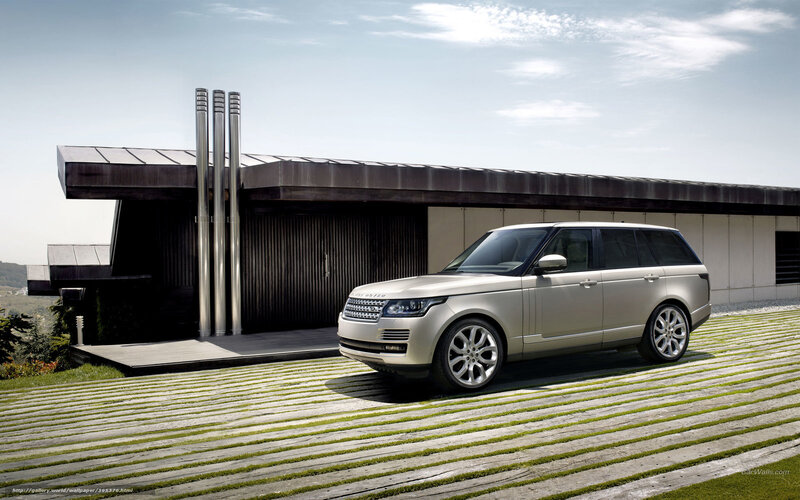 Silver Range Rover in modern setting