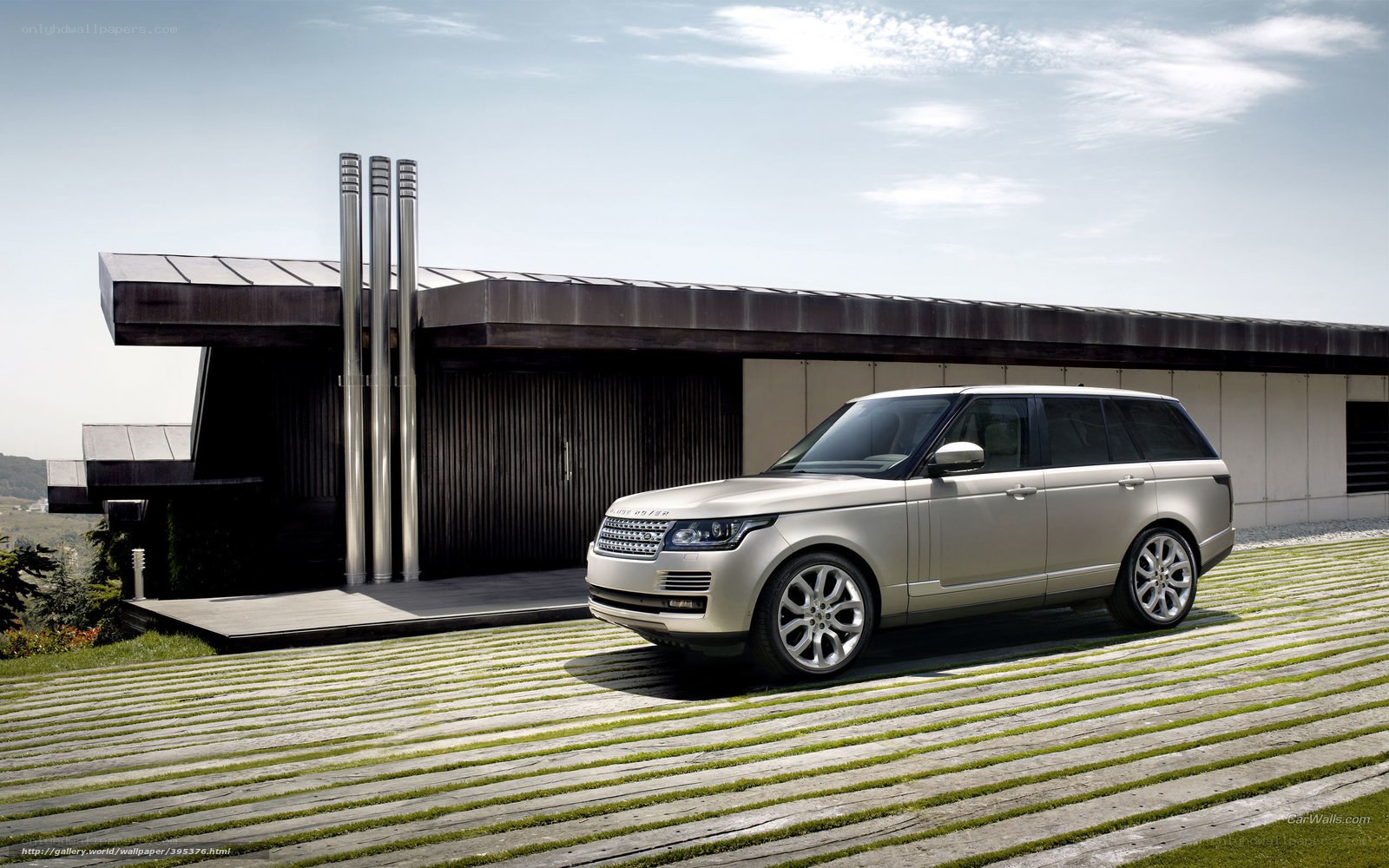 Silver Range Rover in modern setting