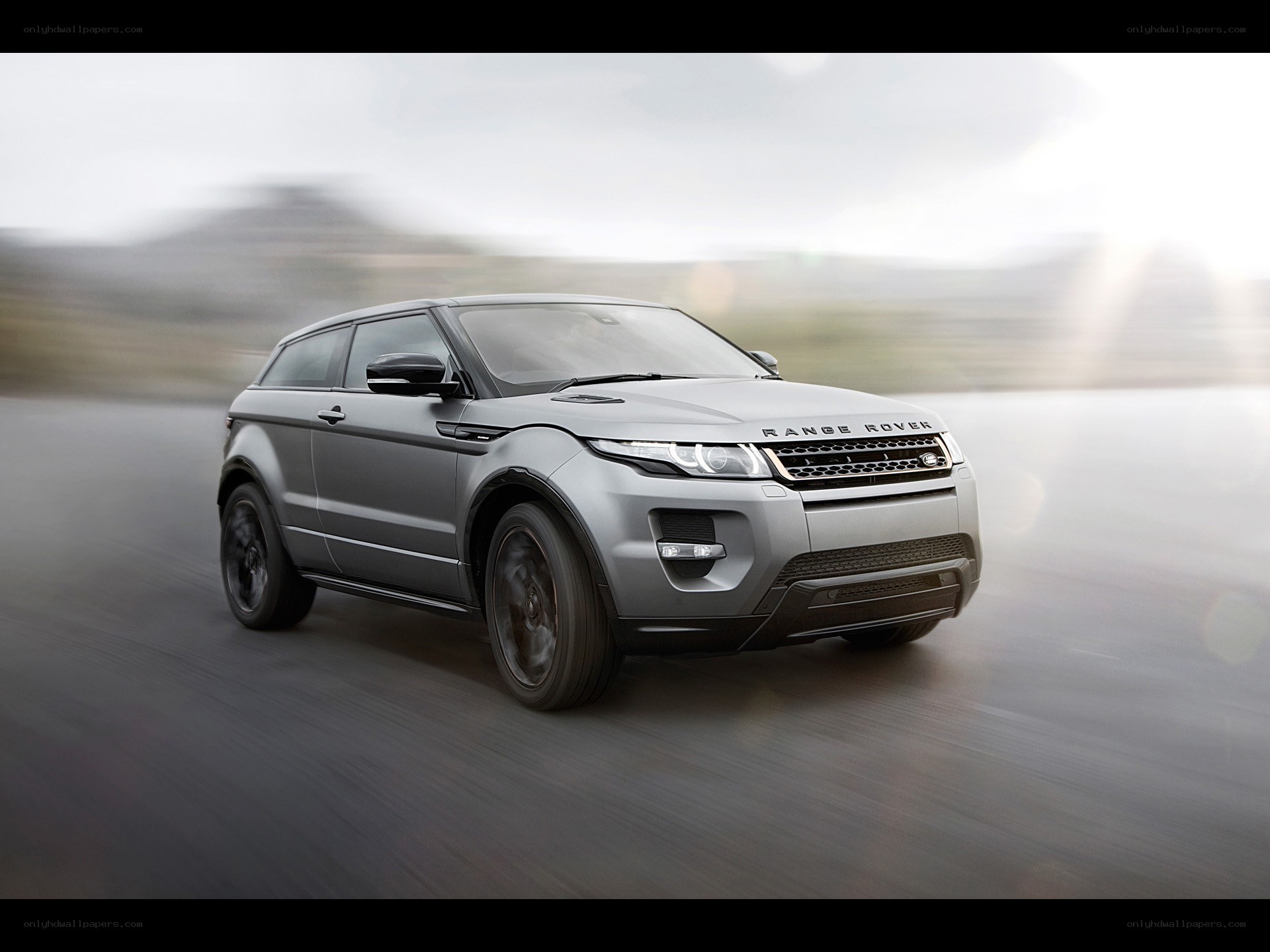 Silver Range Rover in motion
