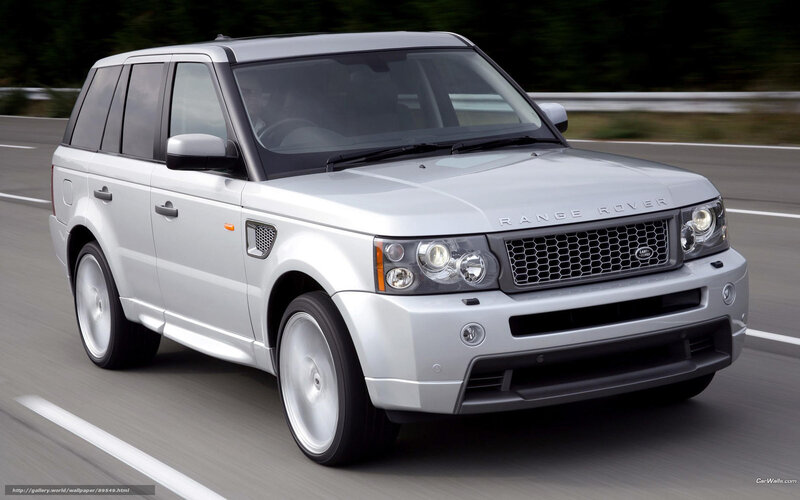 silver range rover in motion