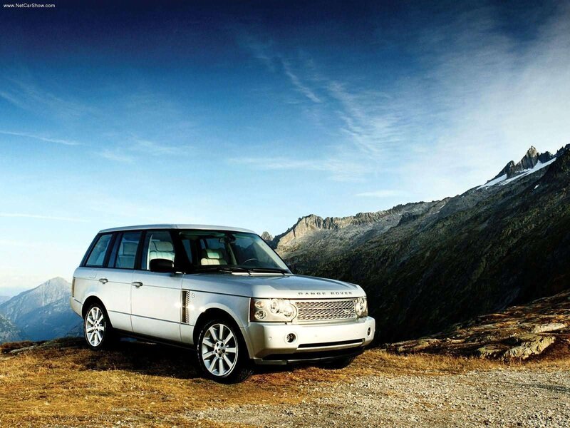 Silver Range Rover in mountains