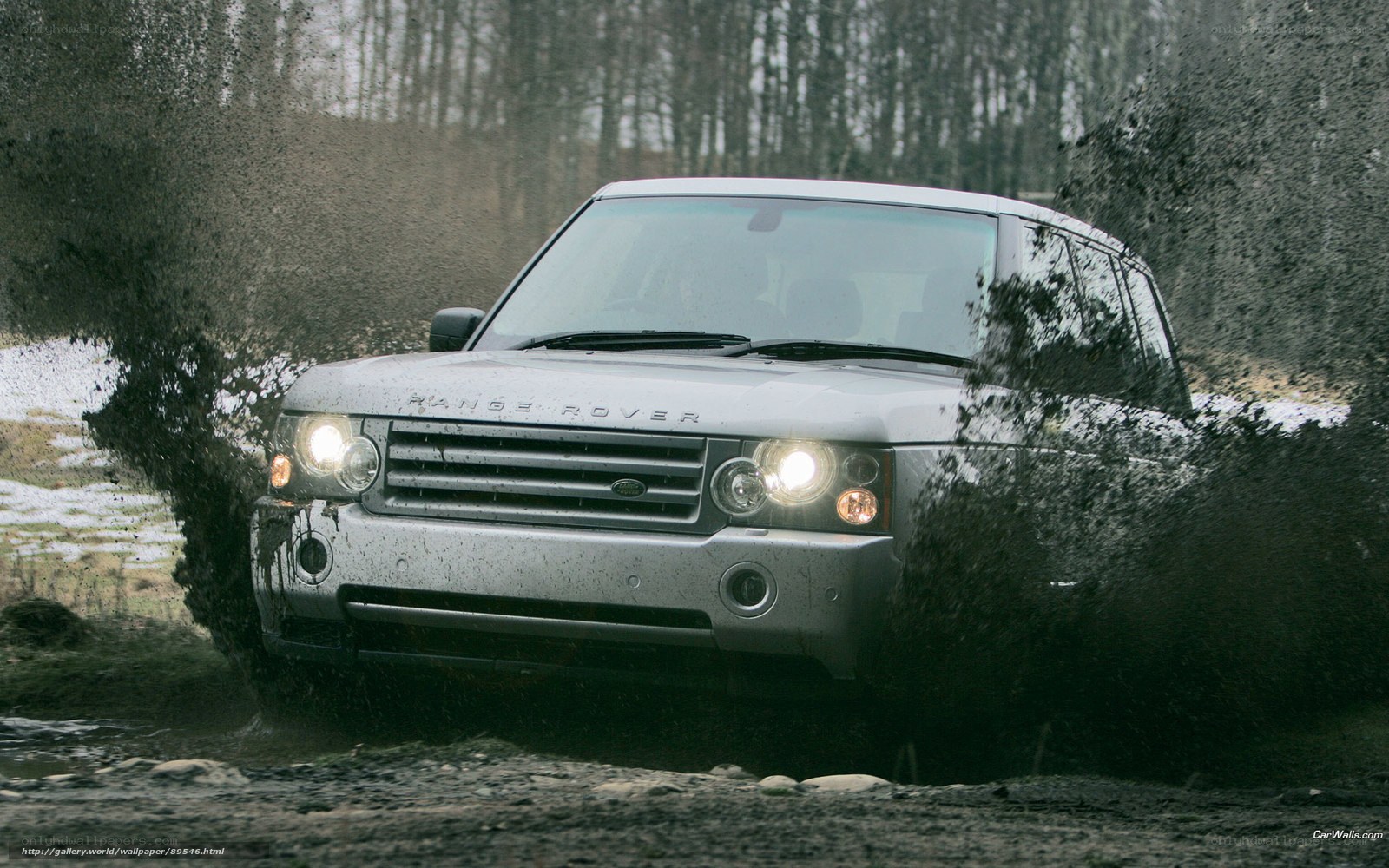 silver range rover in mud