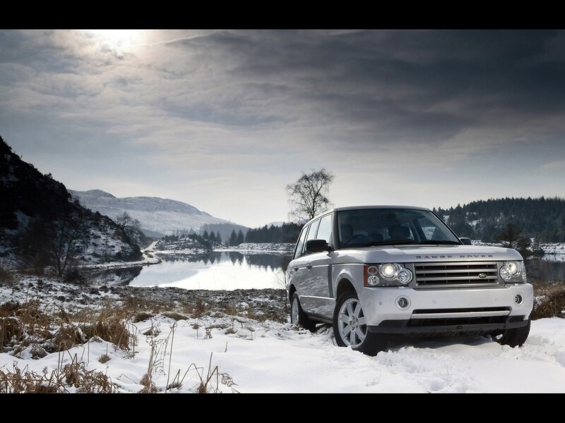 Silver Range Rover in snowy landscape