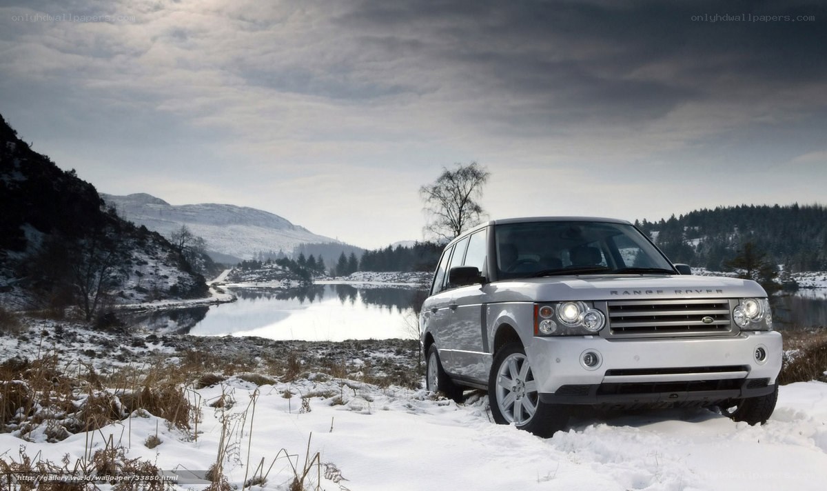 Silver Range Rover in snowy landscape