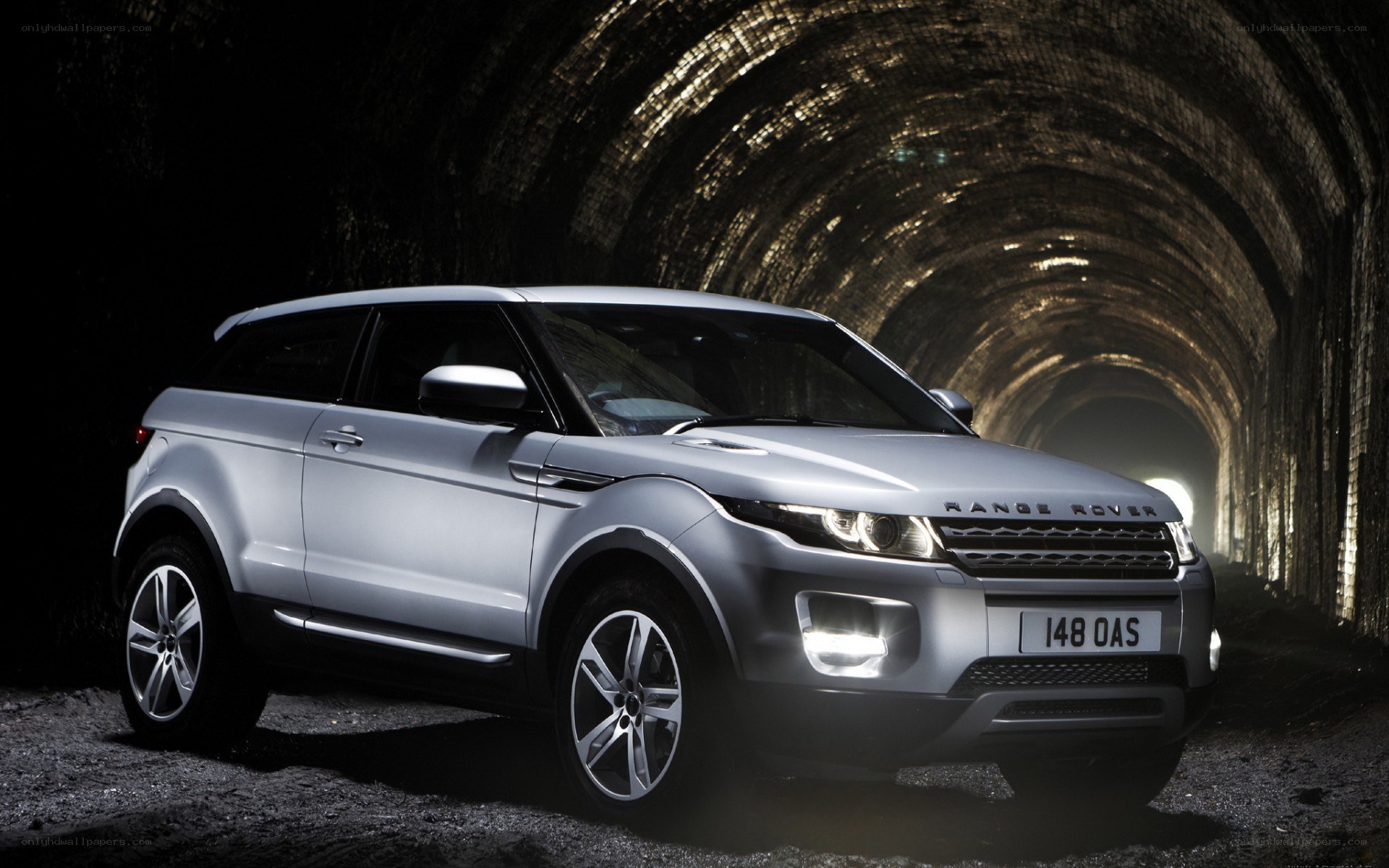 Silver Range Rover in tunnel