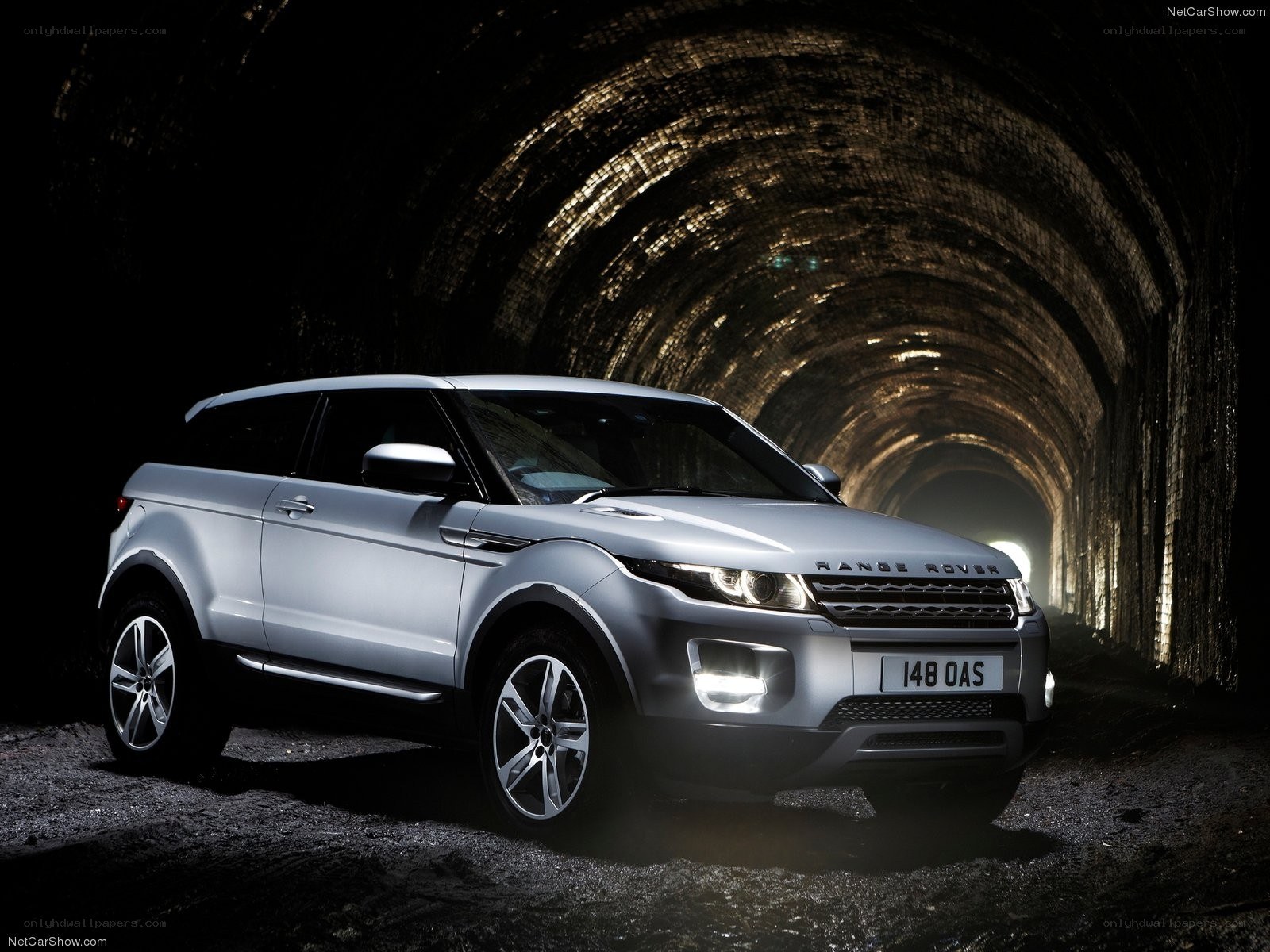 Silver Range Rover in tunnel