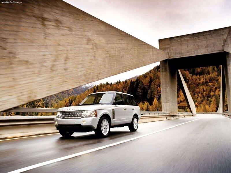 Silver Range Rover on a mountain road