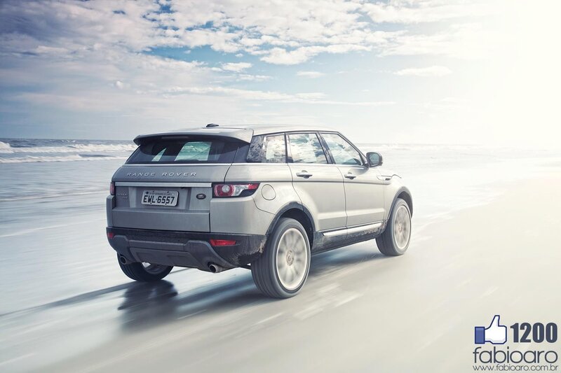 Silver Range Rover on beach