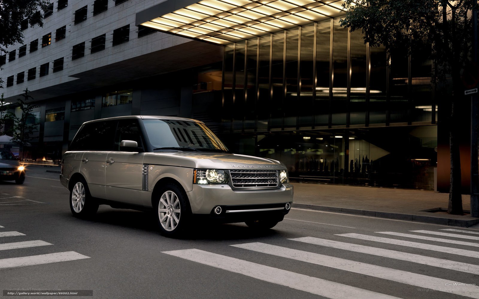 Silver Range Rover on city street