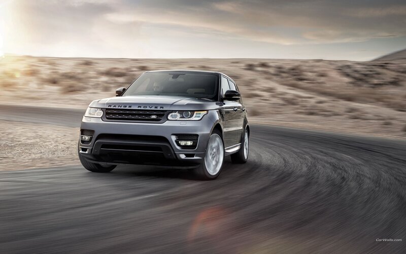 Silver Range Rover on desert road