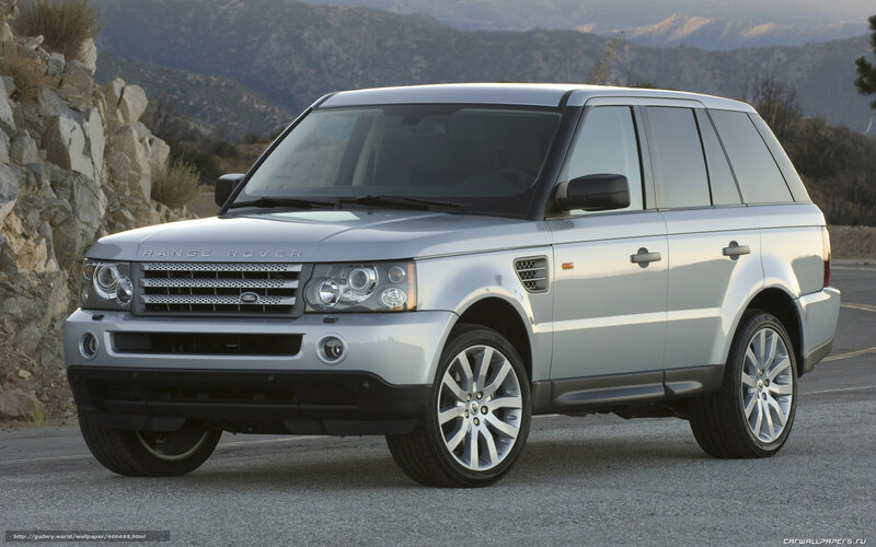 Silver Range Rover parked on road