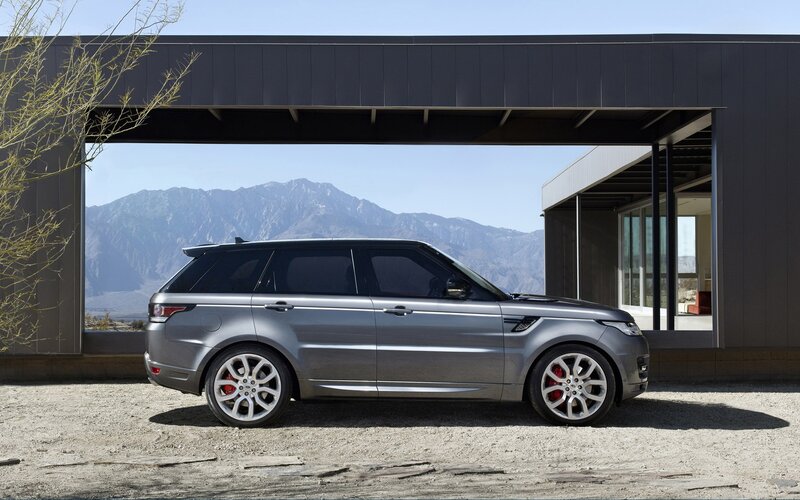 Silver Range Rover parked outside