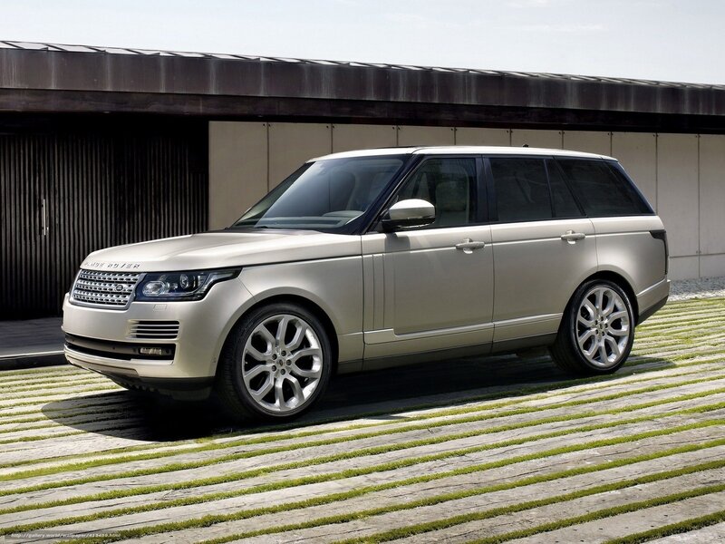 Silver Range Rover parked outside