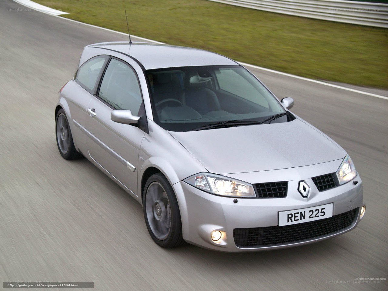 silver renault 225 on racetrack