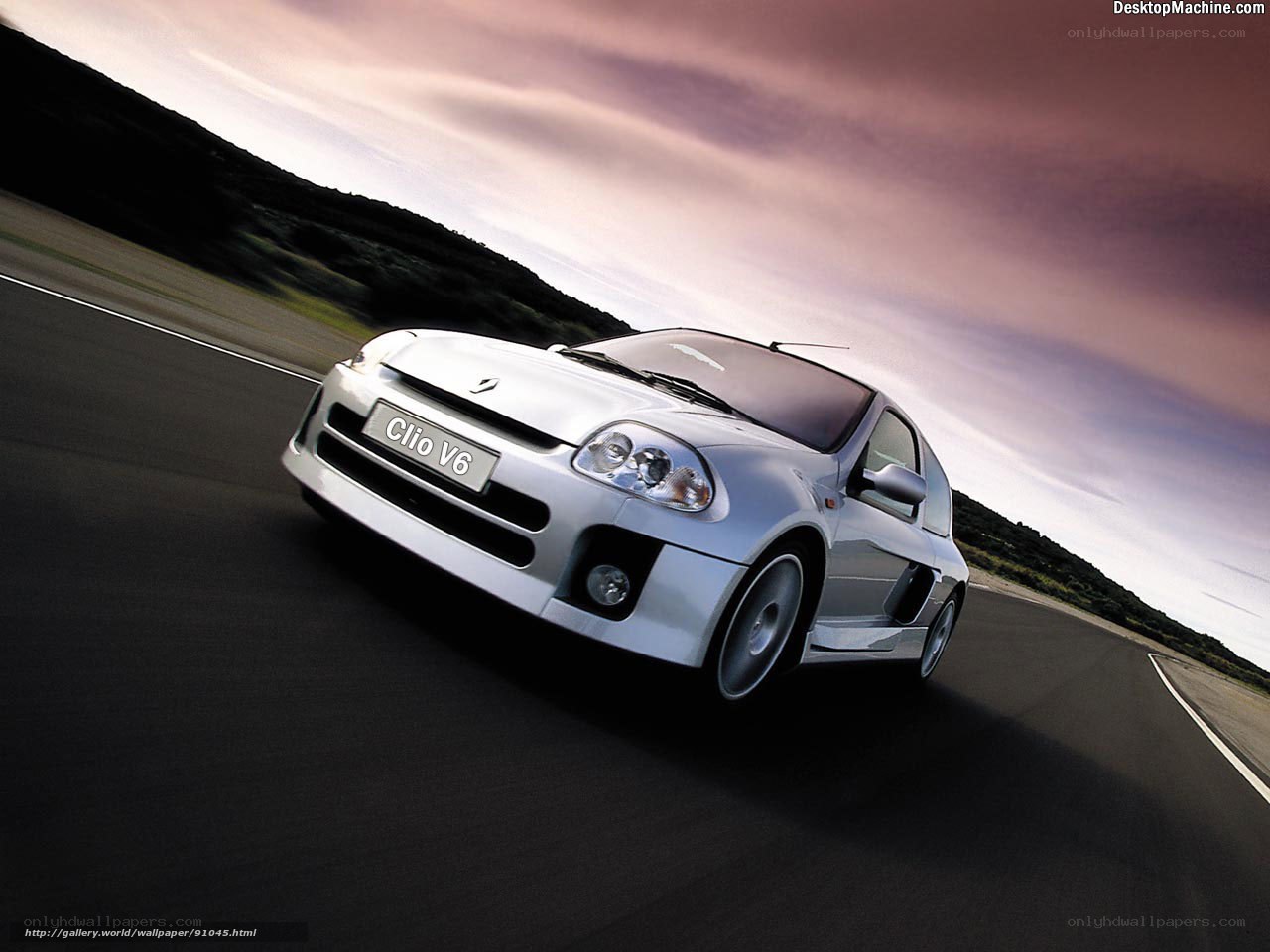 Silver Renault Clio V6 on a road