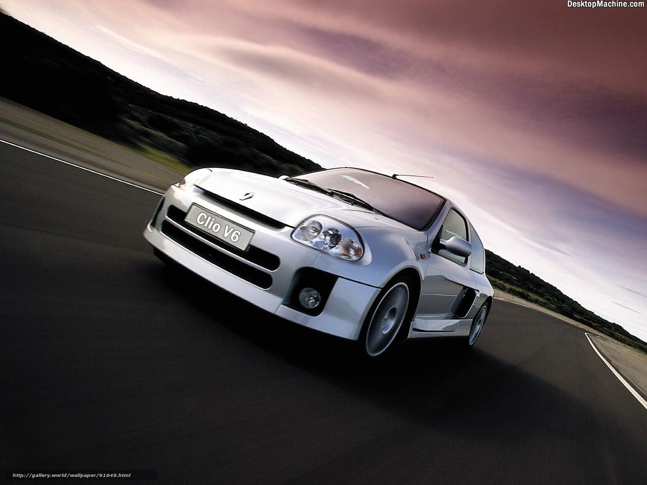 Silver Renault Clio V6 on a road