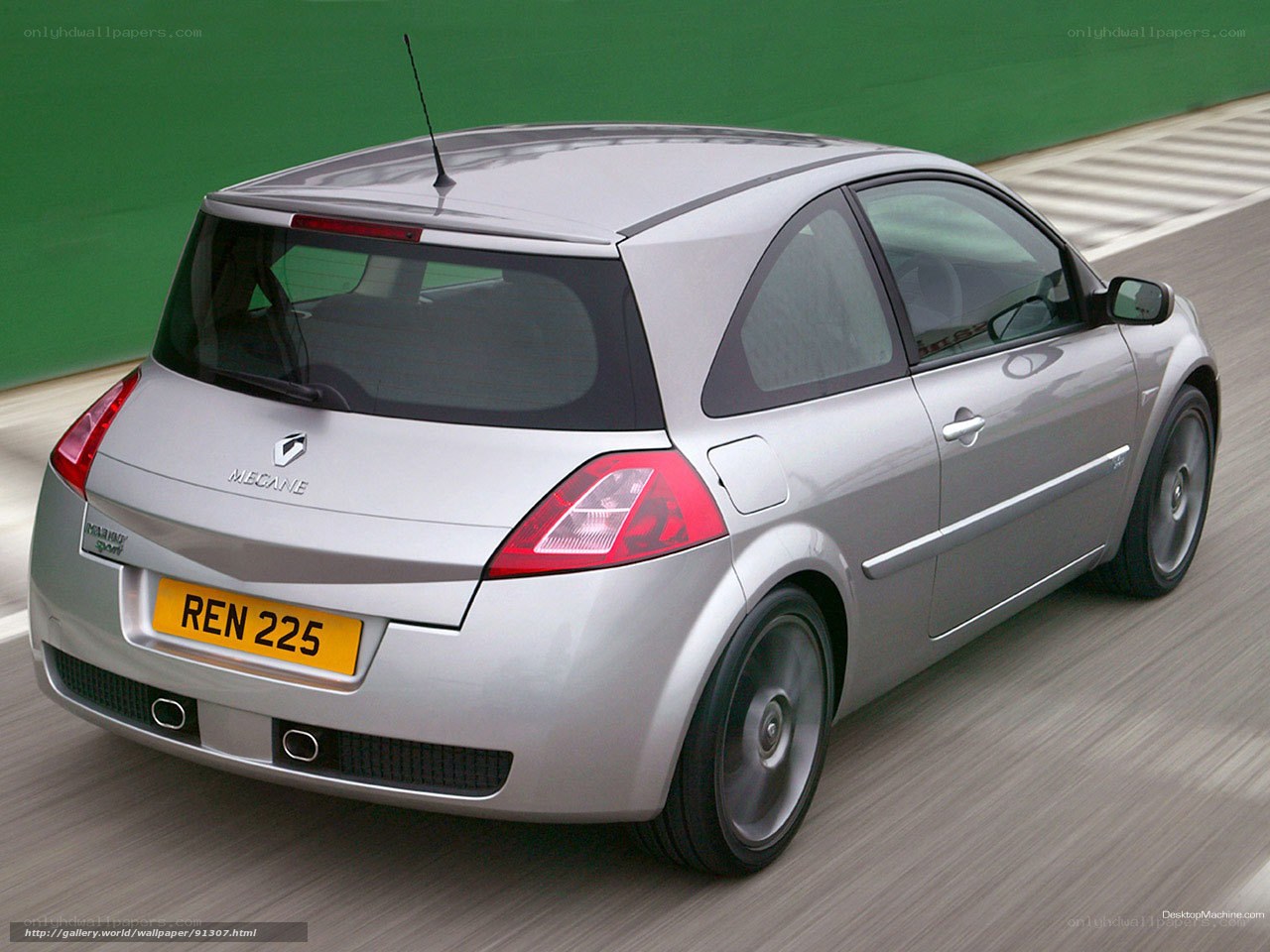 silver renault megane in motion