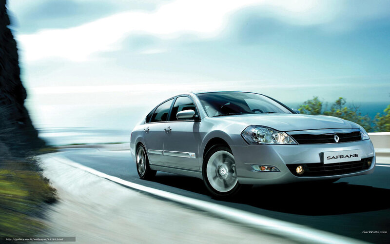 Silver Renault Safrane on coastal road