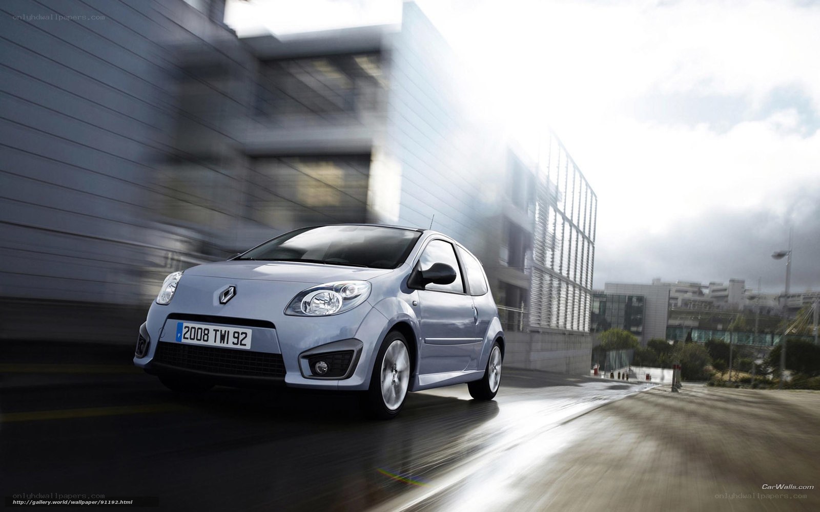 silver renault twingo in motion