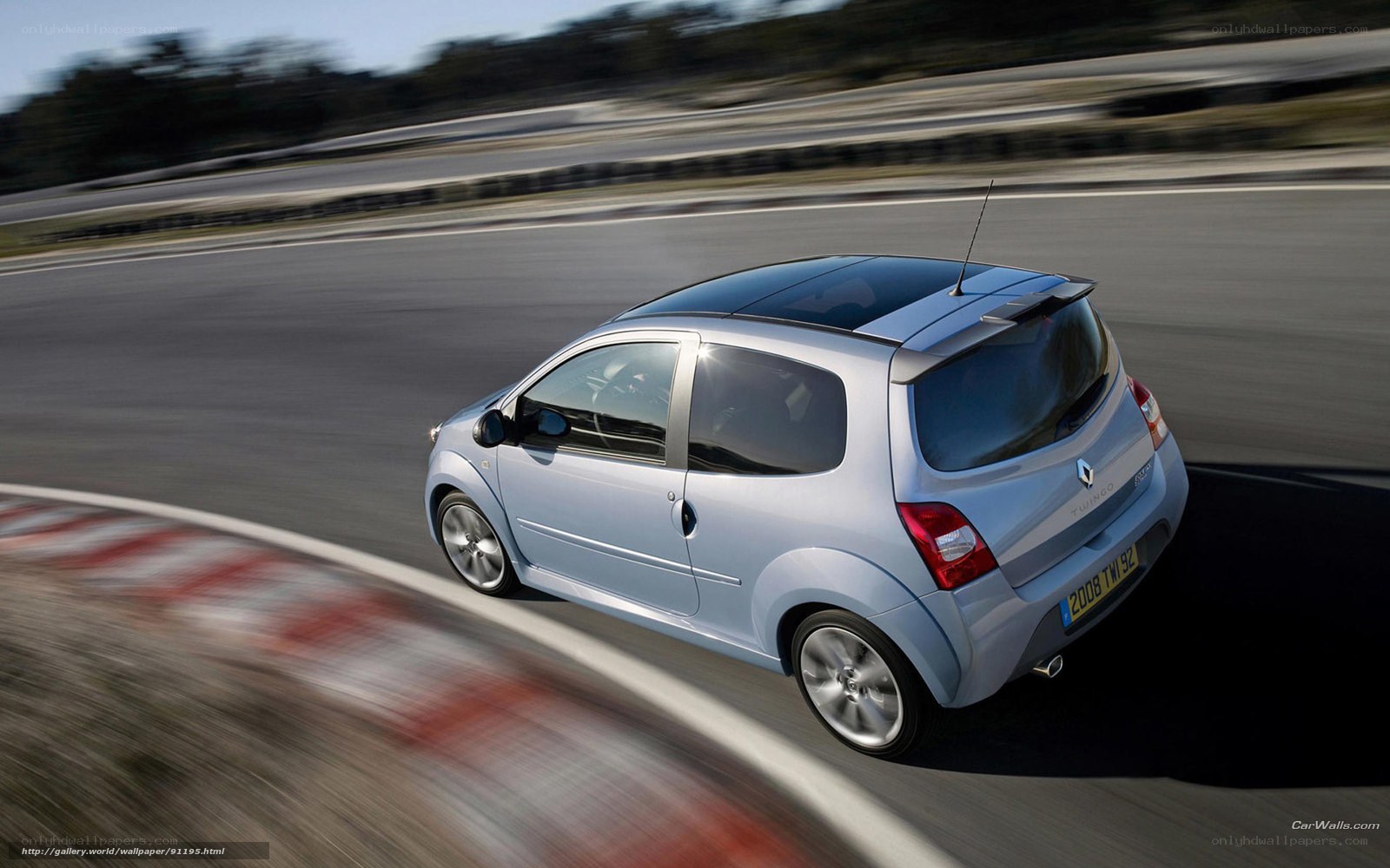 silver renault twingo on track