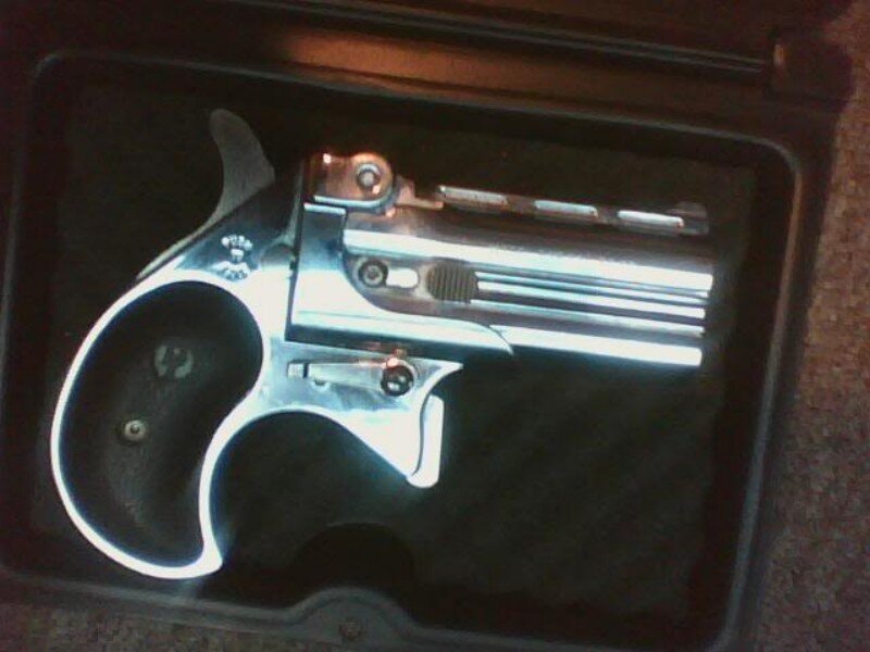 Silver Revolver in Case
