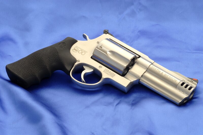 Silver Revolver on Blue Cloth — Neutral
