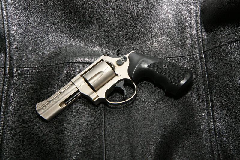 Silver Revolver on Leather