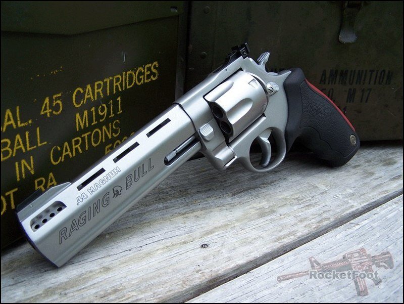 Silver Revolver on Wood