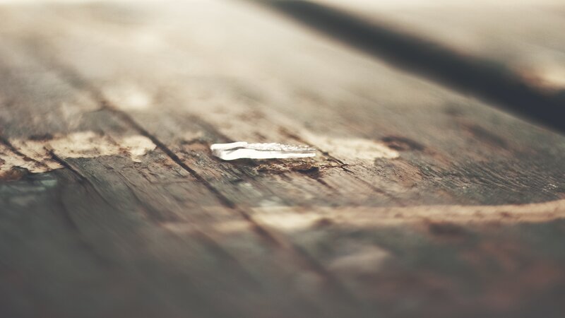Silver Ring on Wood — Brown, Calm