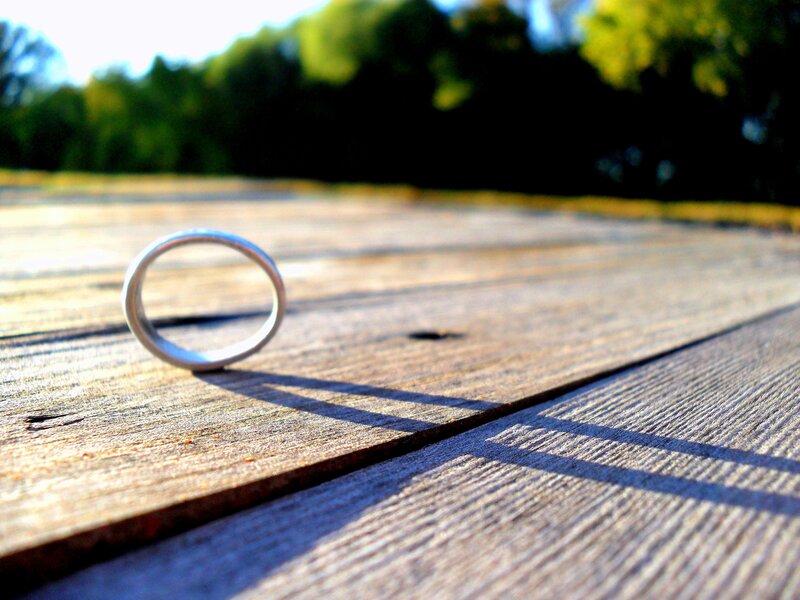 Silver Ring on Wood — Brown
