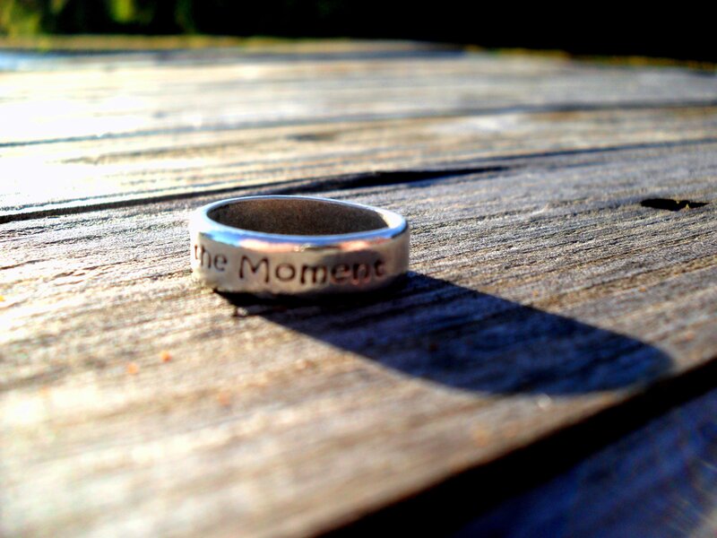 Silver Ring on Wood