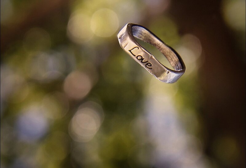 silver ring with 'love' inscription