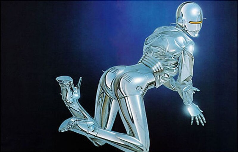 silver robot in crouching pose
