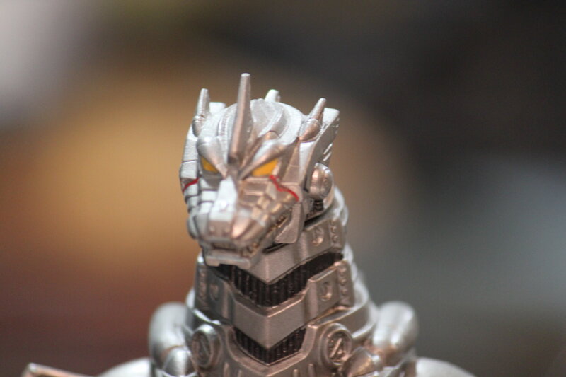 silver robot monster head