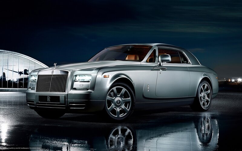 Silver Rolls-Royce at night