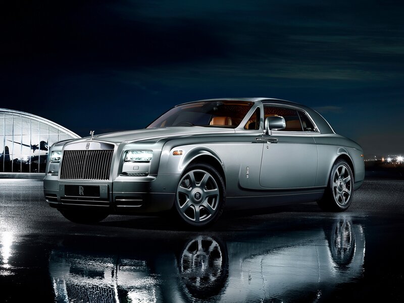 Silver Rolls-Royce Coupe — Dramatic