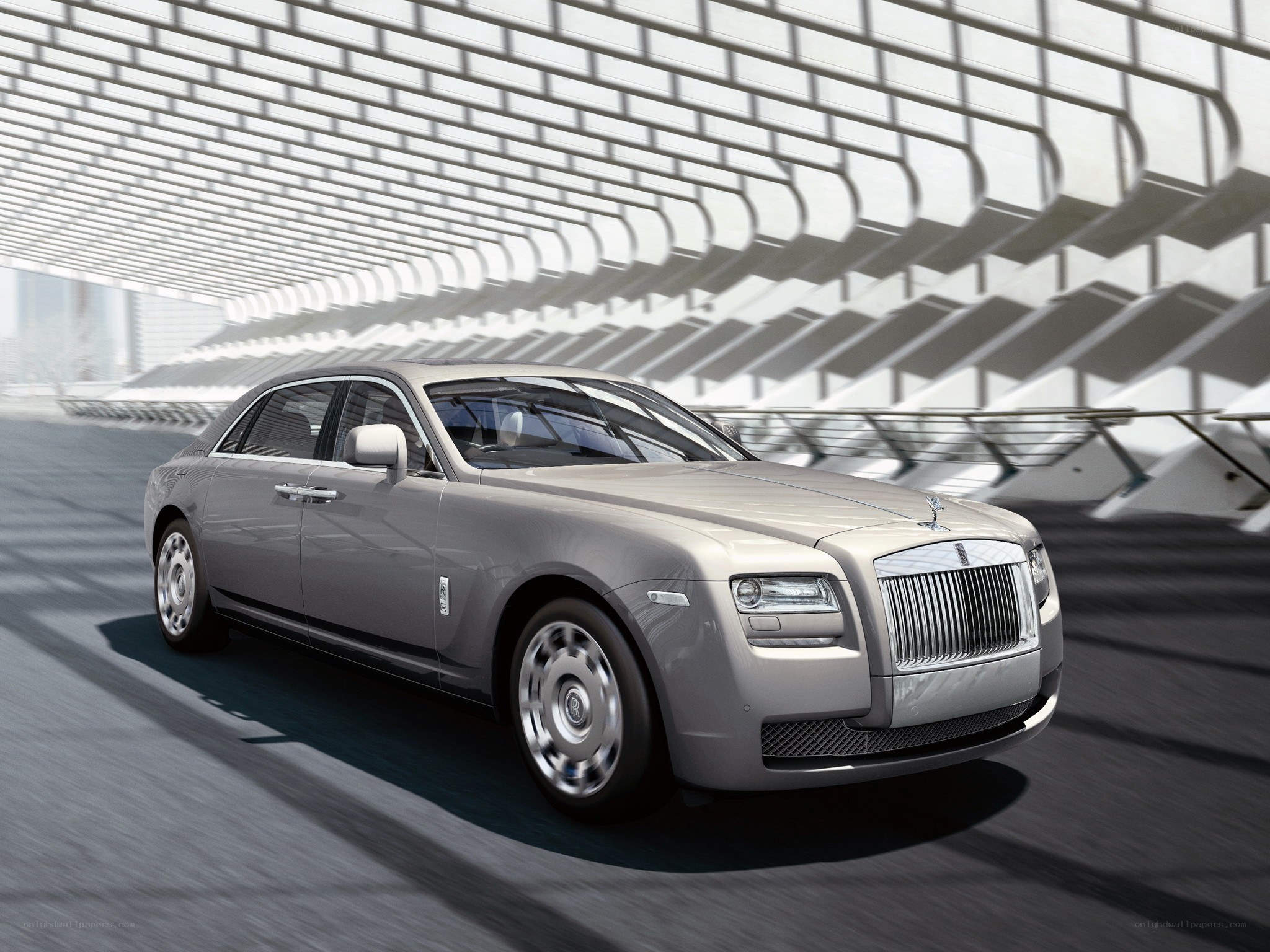 Silver Rolls-Royce Ghost in motion