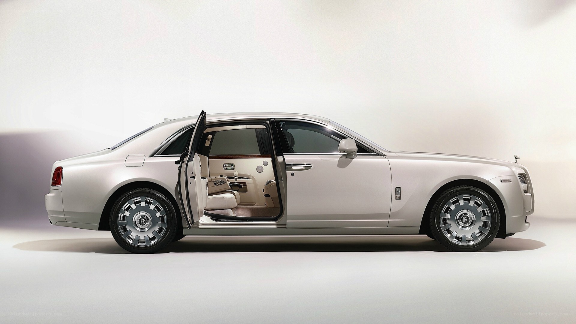 silver rolls-royce with open door