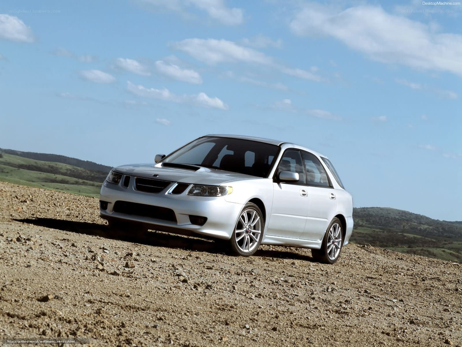 silver saab 9-2x on dirt road