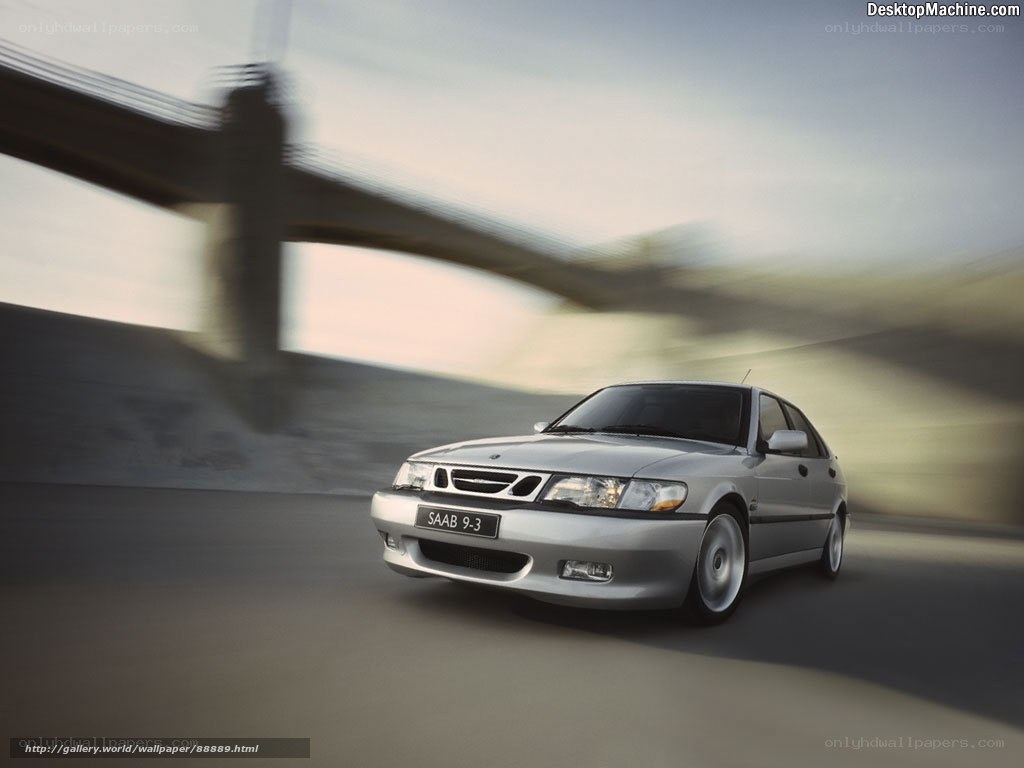 Silver Saab 9-3 in motion