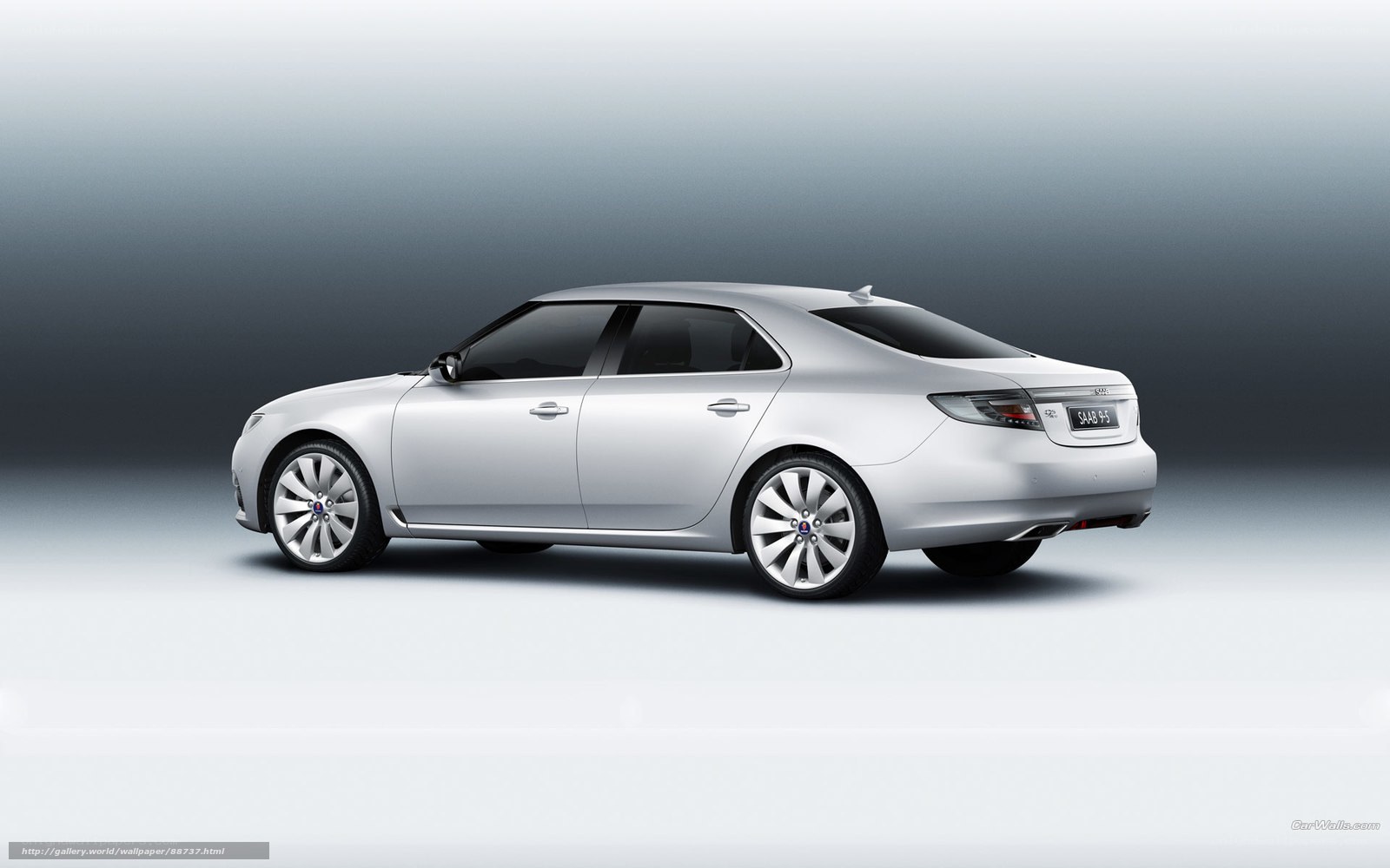 silver saab 9-5 sedan