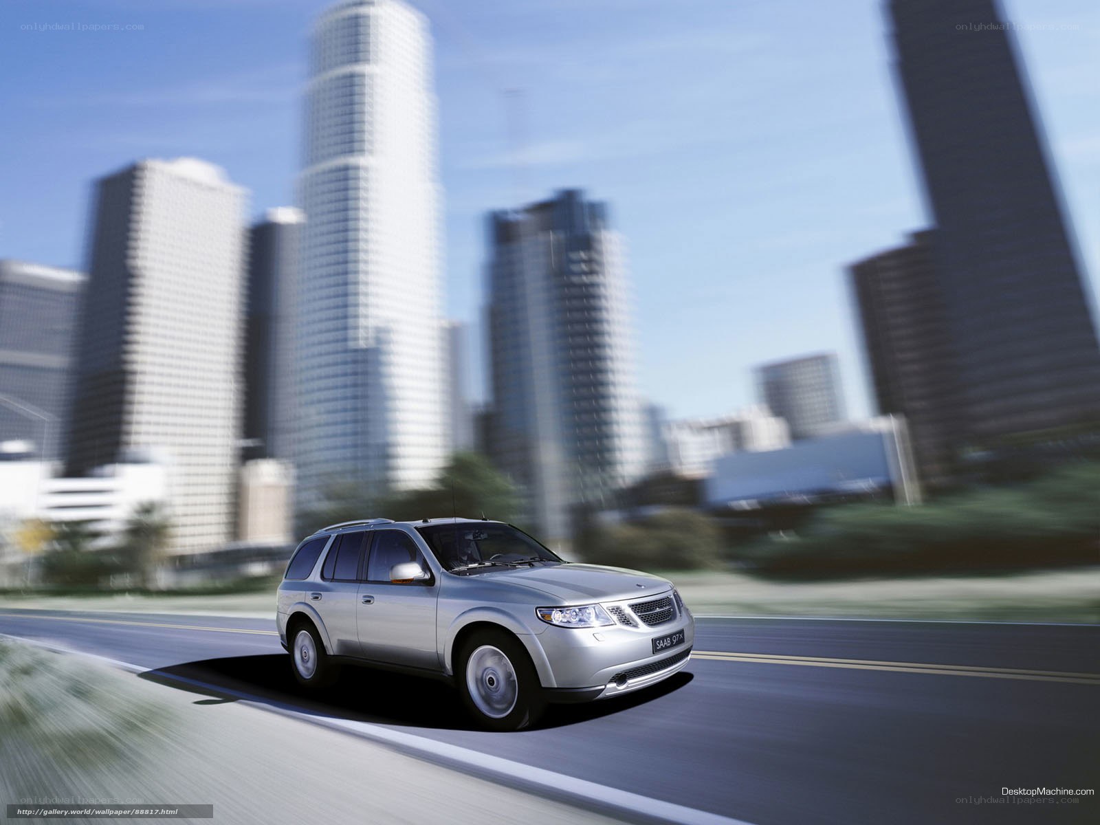 Silver Saab 9-7X in city
