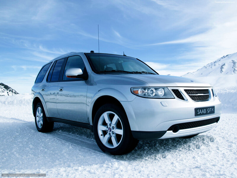 Silver Saab 9-7X in snowy landscape