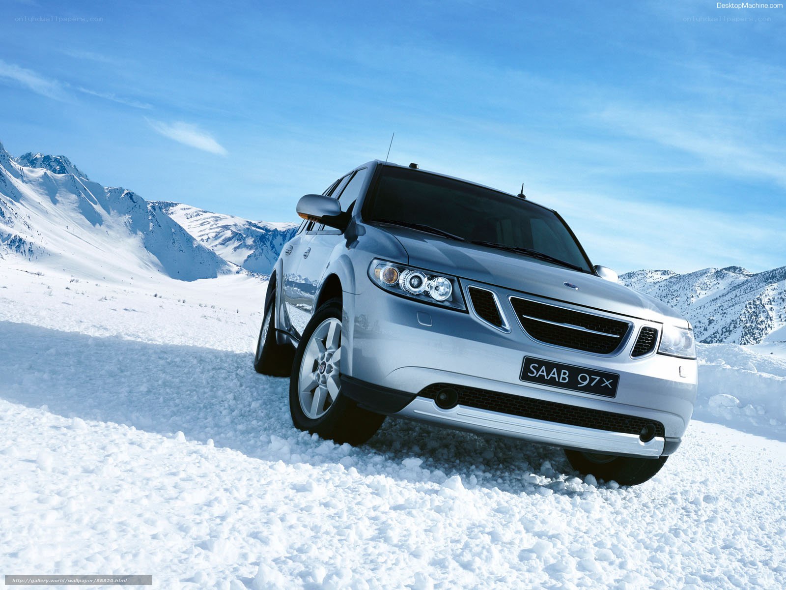 Silver Saab 9-7X in snowy mountains